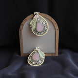 Teardrop statement studs with peacock motif