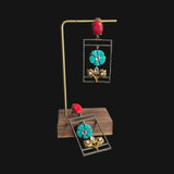 Beautiful copper dual tone earrings with hand carved floral motif