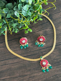 Dainty Jadau Kundan flower pendant set with matching earrings