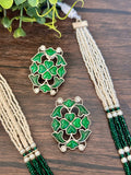 Dual Tone Long pendant set on seed pearls with elephant motif