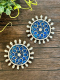Long pendant set on seed pearls with matching studs