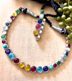 Dainty multi colored stone GS necklace with matching earrings