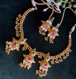 Matt gold necklace with three Pachi pendants
