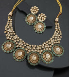 Stunning polki kundan set with mint stones