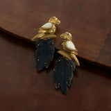 Copper Base Parrot Motif earrings with carved leaf design