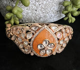 Silver foil kundan bracelet with peach carved stone