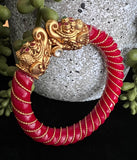 Pola bangles with elephant motifs in gold finish