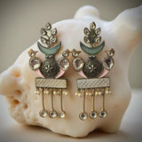 Beautiful dual tone copper earrings with peacock motif