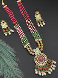 Beads necklace with silver foil pendant and carved stone