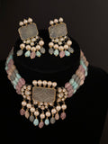 Silver foil with carved stone pendant choker