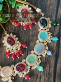 Beautiful necklace set with different carved stones