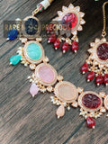 Beautiful necklace set with different carved stones
