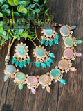 Beautiful necklace set with different carved stones