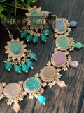 Beautiful necklace set with different carved stones