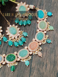 Beautiful necklace set with different carved stones