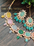 Beautiful necklace set with different carved stones