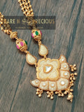 Matt gold long chain with faux ivory pendant