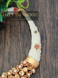 Beautifully carved faux ivory hasli with carved flower pendant