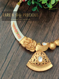Asymetric faux Ivory hasli with beautiful matt gold prendant