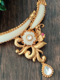 Faux ivory necklace with matching flower earrings
