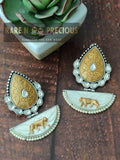 Dual tone copper earrings with carved stones