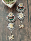 Dual tone german silver earring with nandi